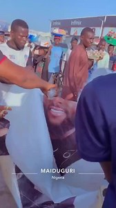 Banner with Davido's photo was set ablaze in Maiduguri! This is coming after Davido shared a video of his new signee, Logos Olori singing, dancing and praying with people dressed in Islamic outfit in front of a mosque. | HOT POT AMAKA